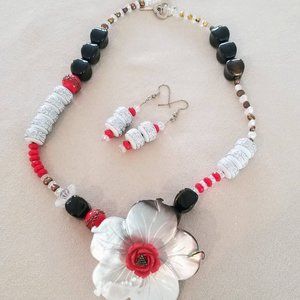 Hand made one of a kind necklace and earrings made of vintage beads from Germany